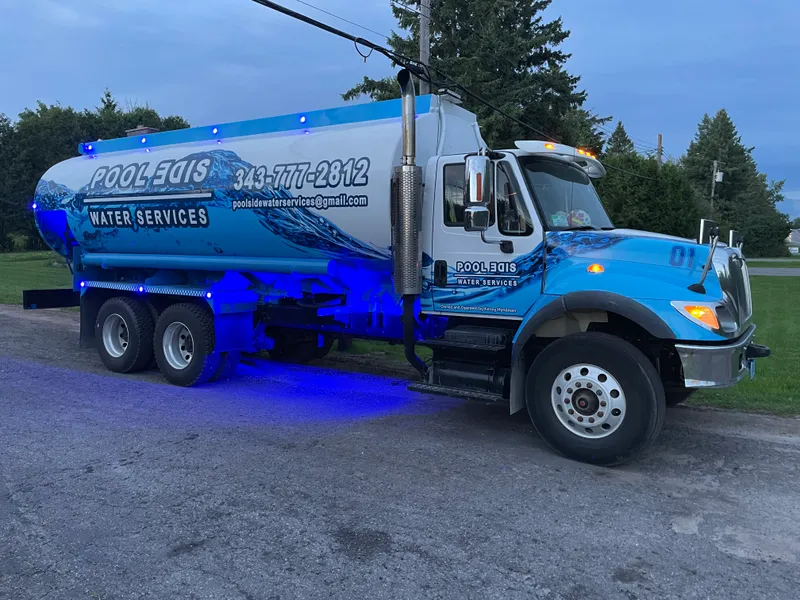 Pool Side Water Services team preparing a water delivery in Ottawa
