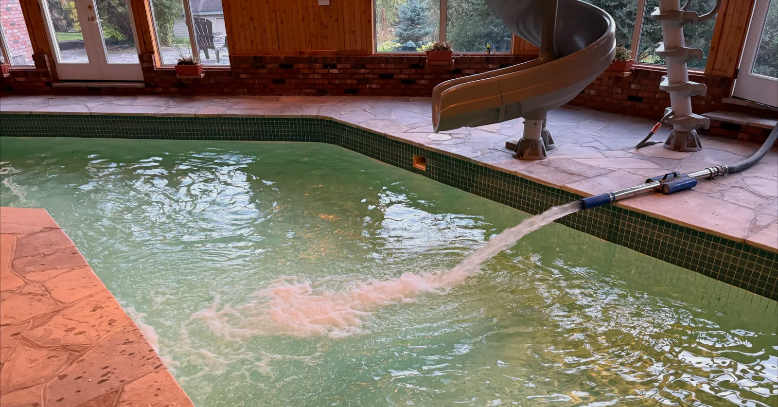 Indoor residential pool in Ottawa being filled with fresh hydrant water by Pool Side Water Services